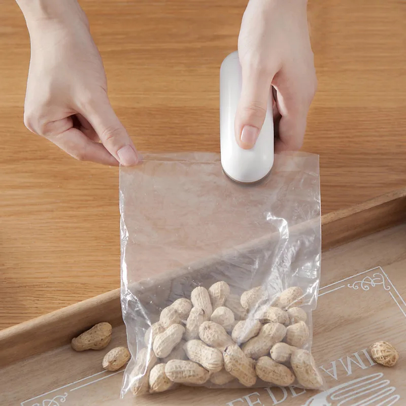 Мини-портативный термозапайщик – обзор и цена Food Storage Machine